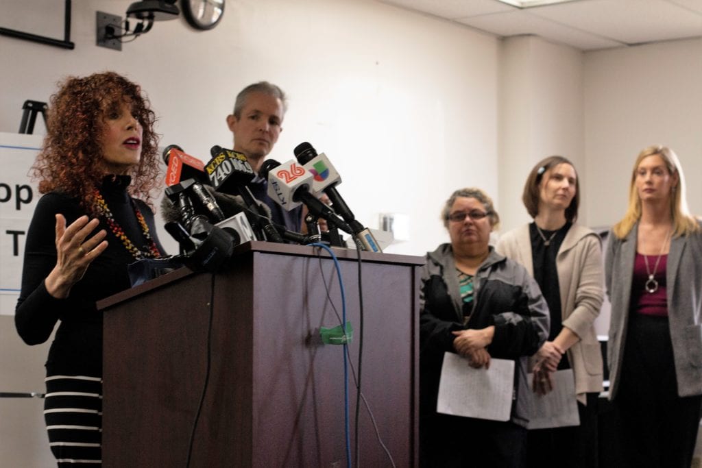 Ruth Silver-Taube, a Bay area lawyer and human rights advocate, addresses members of the media at a news conference regarding the expansion of funding for the Santa Clara County Office of Labor Standards Enforcement. Also pictured: Ben Field, Magaly Mata, Derecka Mehrens and Jenny Higgins Bradanini. Photo by Kyle Martin.