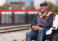 A man sitting in a wheelchair