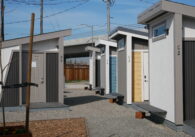 A row of tiny homes for formerly homeless people