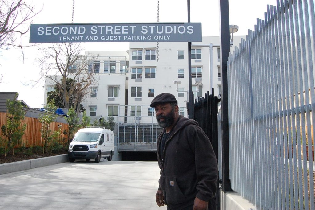 A resident of Second Street Studios, San Jose's first permanent supportive housing project, is pictured in this file photo.