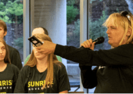 Roxanne rallies with climate activists at the Santa Clara County Democratic Party Central Committee on Aug. 1, 2019. She said finding employment as a transgender woman has been difficult over the years. Photo courtesy of Tara Sreekrishnan.