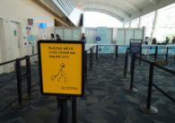 One of the many signs inside the airport requiring travelers to wear masks. Photo courtesy of Norman Y. Mineta-San Jose International Airport.