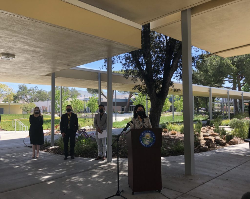 Deputy County Executive Dr. Rocio Luna urges the Latino community of East San Jose to get their COVID vaccine. Photo by Lorraine Gabbert.