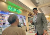 Two men stand inside a shopping center in San Jose