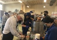 People package soup for people in need in San Jose, California