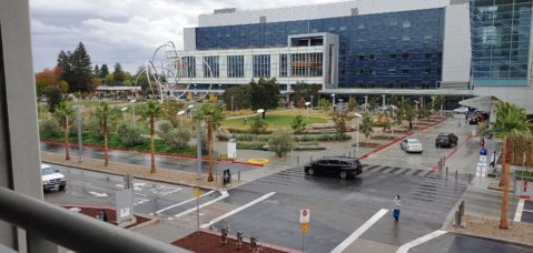 Valley Medical Center VMC Cars driving by a hospital in San Jose, California