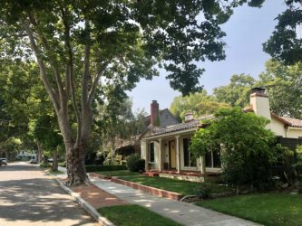 A single-family home on a tree-lined street in the Willow Glen neighborhood of San jose