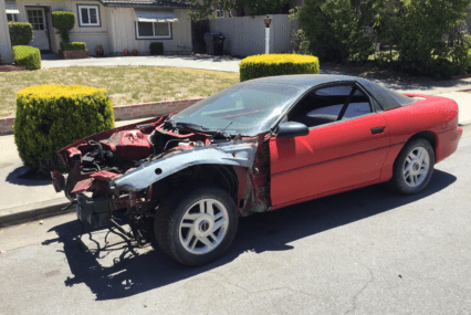 An abandoned vehicle parked on a street in San Jose, California