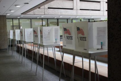 A row of voting booths at the Registrar of Voters in Santa Clara County, California