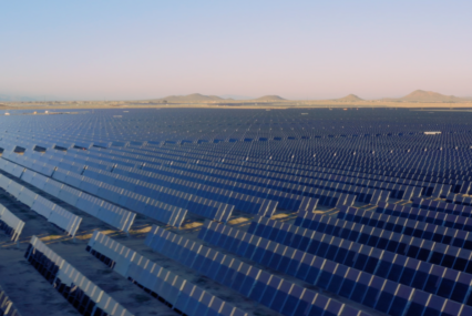 Rows of solar panels stretching to the horizon line