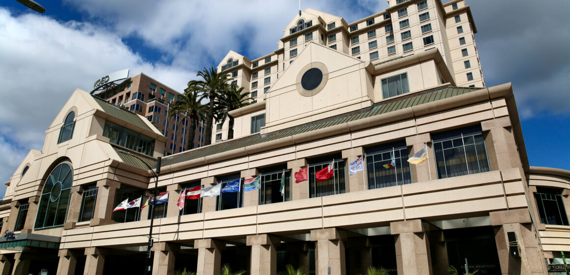The exterior of a large hotel in downtown San Jose, California