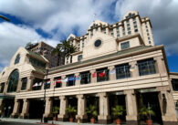 The exterior of a large hotel in downtown San Jose, California