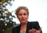 A woman looking directly into the camera