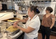 Acopio employee Sara Cardenas making corn tortillas as restaurant owner Lorena Vidrio watches. Photo by Robert Eliason.