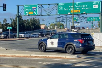 A police car sits at an intersection in San Jose, California