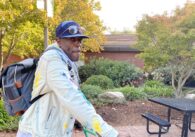 Michael Love with his bike in front of the Sunnyvale Public Library