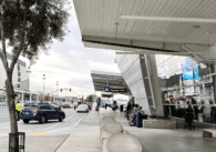 Cars pulling in at the loading and unloading curb by San Jose airport