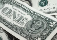 U.S. dollar bills layered on top of each other