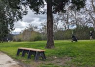 A golfer runs back to their club bag at Cupertino's Blackberry Farm Golf Course, where fees will increase a few dollars in April.