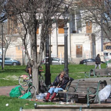 St. James Park A homeless person sitting on a park bench in San Jose, California