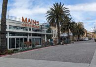 A building with a sign that reads Main St. Cupertino