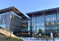Sunnyvale City Hall, a 4-floor window mostly covered in glass windows with large solar panels on top