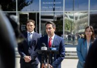 Santa Clara County District Attorney Jeff Rosen speaks outside at a podium