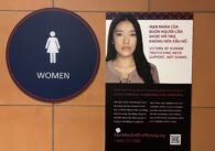 A sign in the public restroom in an airport