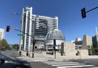 San Jose City Hall rotunda and building behind Fourth Street intersection lights
