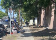 Lived in vehicles parked alongside a sidewalk