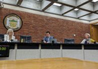 Three councilmembers sit behind the dais in Los Gatos