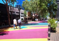 Street in city painted in bright geometric colors