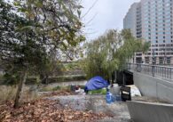 A homeless camp next to a creek in San Jose