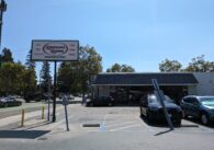 The parking lot of a shuttered convenience store