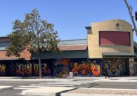 Colorful murals on the outside of a building in East San Jose