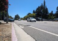 Photo of an unprotected bike lane on a busy street with cars in Cupertino