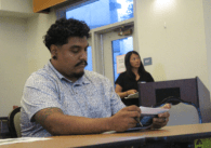 Berryessa Flea Market Advisory Group leader Roberto González watching a city-led presentation on potential new market sites on Sept. 11, 2024. Photo by Vicente Vera.