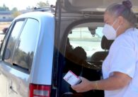 Woman holding Narcan