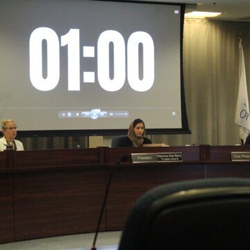 Santa Clara County Board of Education President Maimona Afzal Berta (center) among fellow trustees on Wednesday. Photo by Vicente Vera.