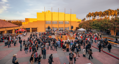 A crowd of people at an outdoor festival in East San Jose