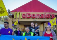 Union members protest outside of a McDonald's in San Jose