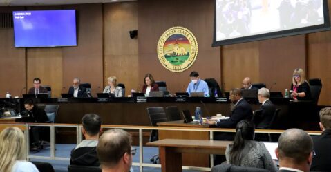Santa Clara City Council seated at dias with city crest behind