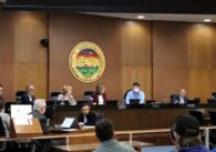Santa Clara City Council seated at dias with city crest behind