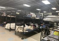 Rows of bunk beds in a homeless shelter in San Jose