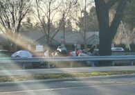 A homeless encampment along a road