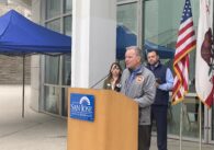 A man speaks at a podium outside in San Jose, California