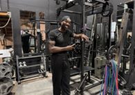 A Black man standing in a gym