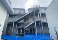 Stairs leading up to the higher levels of a modular housing site for homeless people in San Jose, California