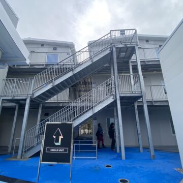 Stairs leading up to the higher levels of a modular housing site for homeless people in San Jose, California