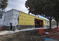 A one-story building under construction.